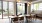 a kitchen table with chairs