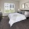 a bedroom with a bed and a mirror